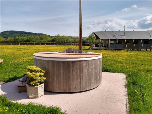 safari tent with hot tub